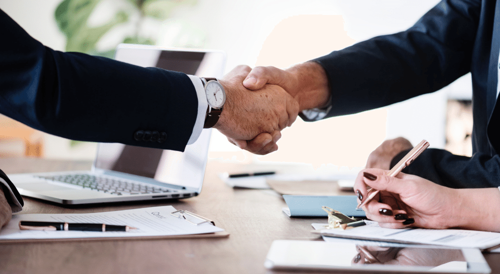 Business people shaking hands